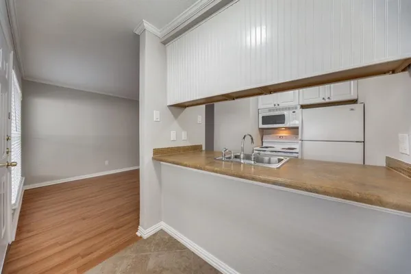 a very nice looking room with wooden floor