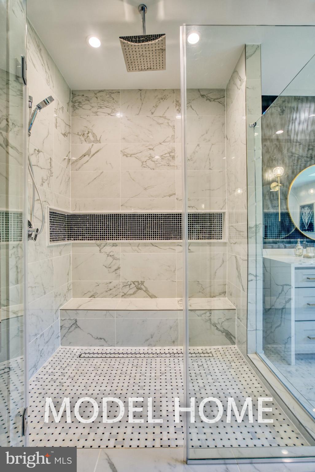 301 Nutley Street Southwest Vienna, VA 22180 - Photo 23 of 48 a bathroom with a bathtub and a shower