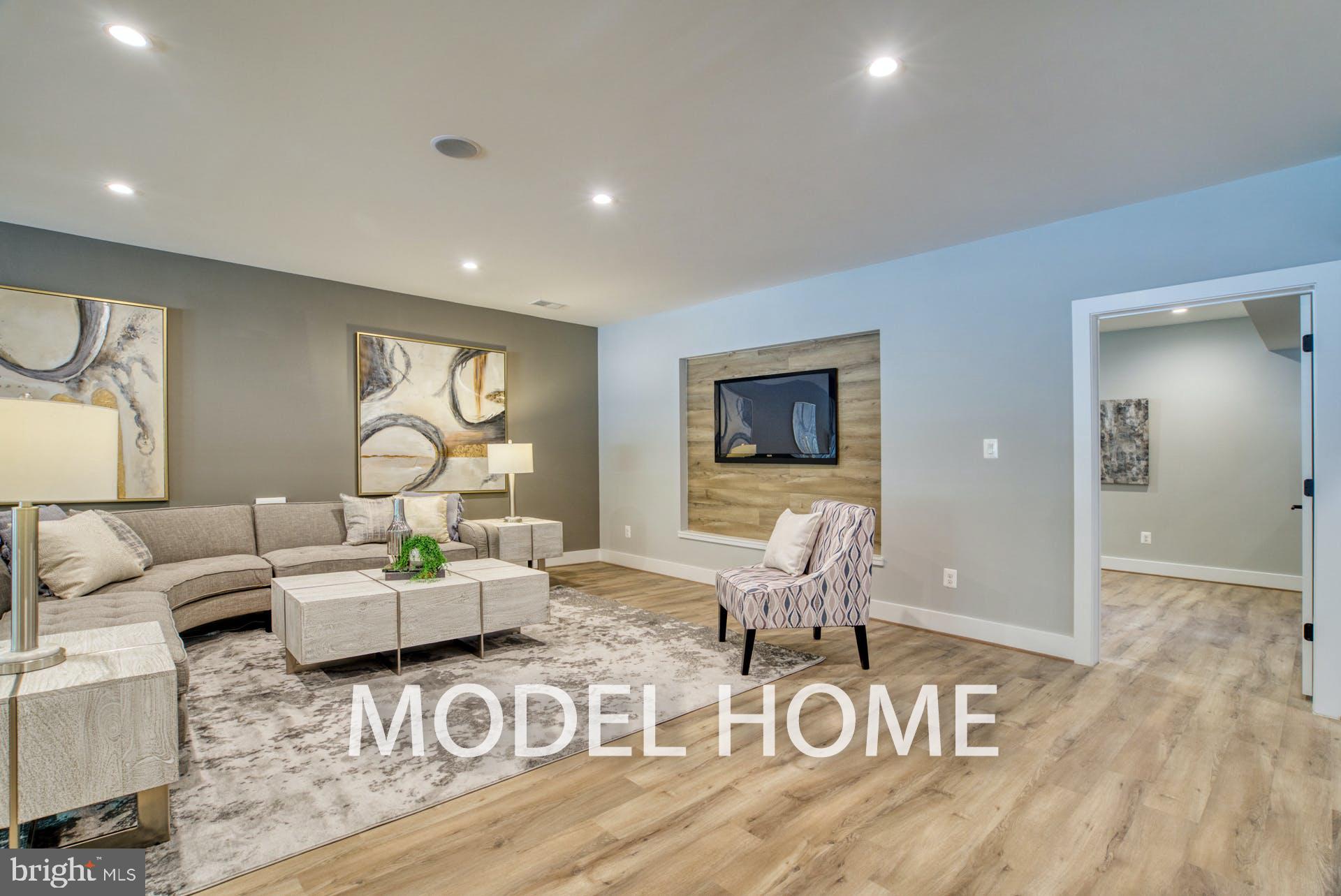 301 Nutley Street Southwest Vienna, VA 22180 - Photo 42 of 48 a living room with furniture and wooden floor