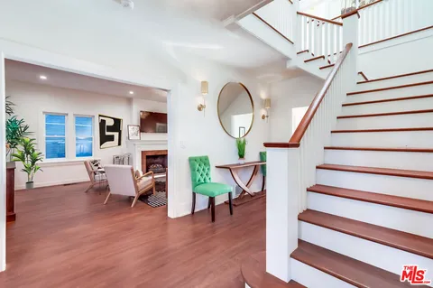 a bedroom with bed and window