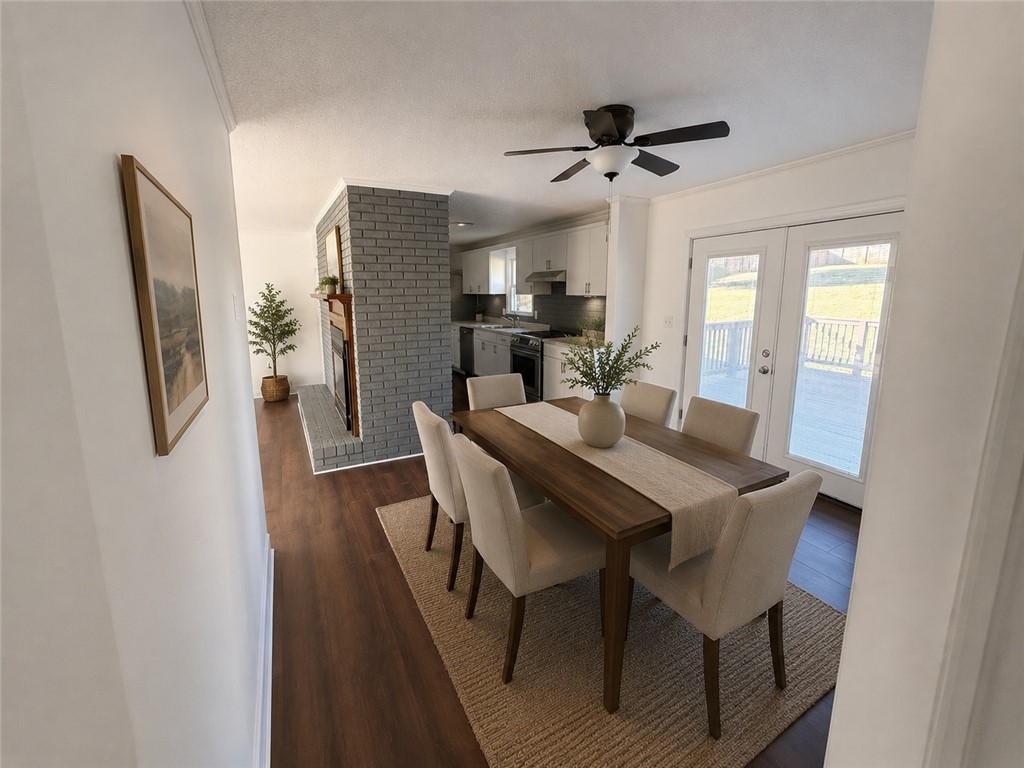 404 McClain Road Anderson, SC 29626 - Photo 12 of 24 This versatile open-concept space features warm flooring and convenient outdoor access.