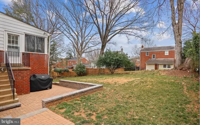 a sign board with a yard