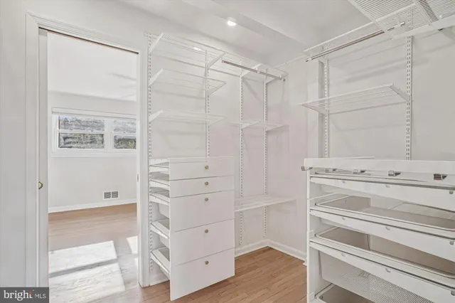a view of an empty walk in closet