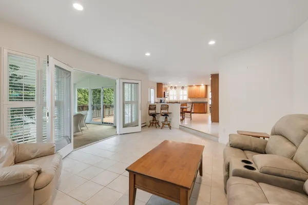 a living room with furniture and a table