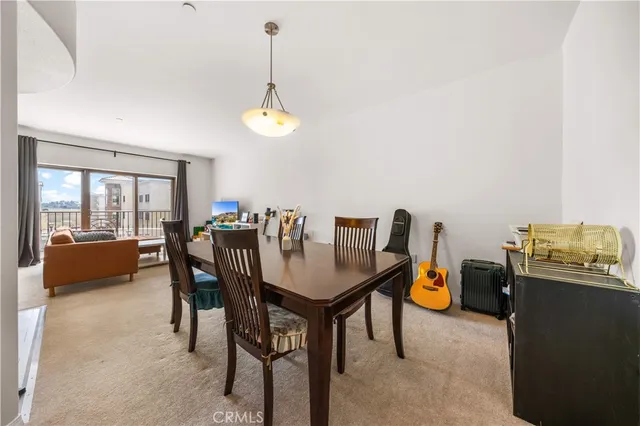 a bedroom with a bed chair and a window