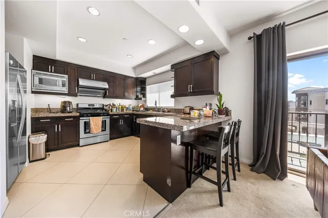 a bathroom with a toilet and shower