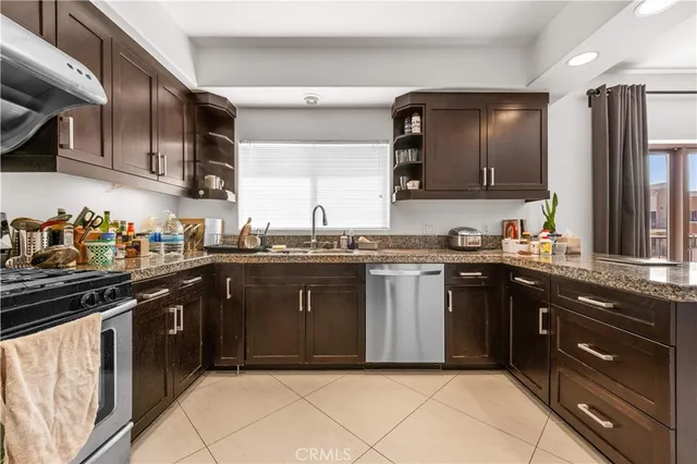 a spacious bathroom with a bathtub sink mirror and toilet