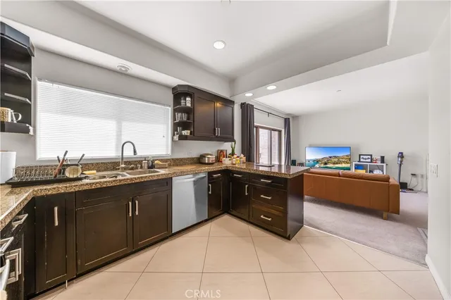 a bathroom with a sink vanity and mirror