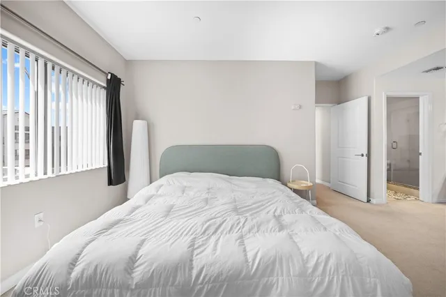 a bathroom with a toilet sink and shower