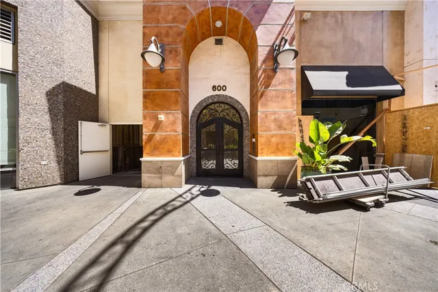 a living room with a couch and a fireplace