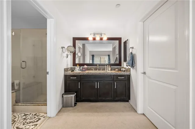 a view of parking area with parked cars