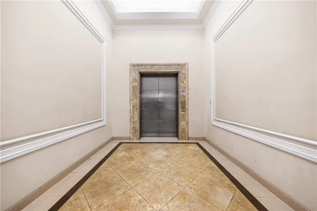 a view of a storage & utility room with a window