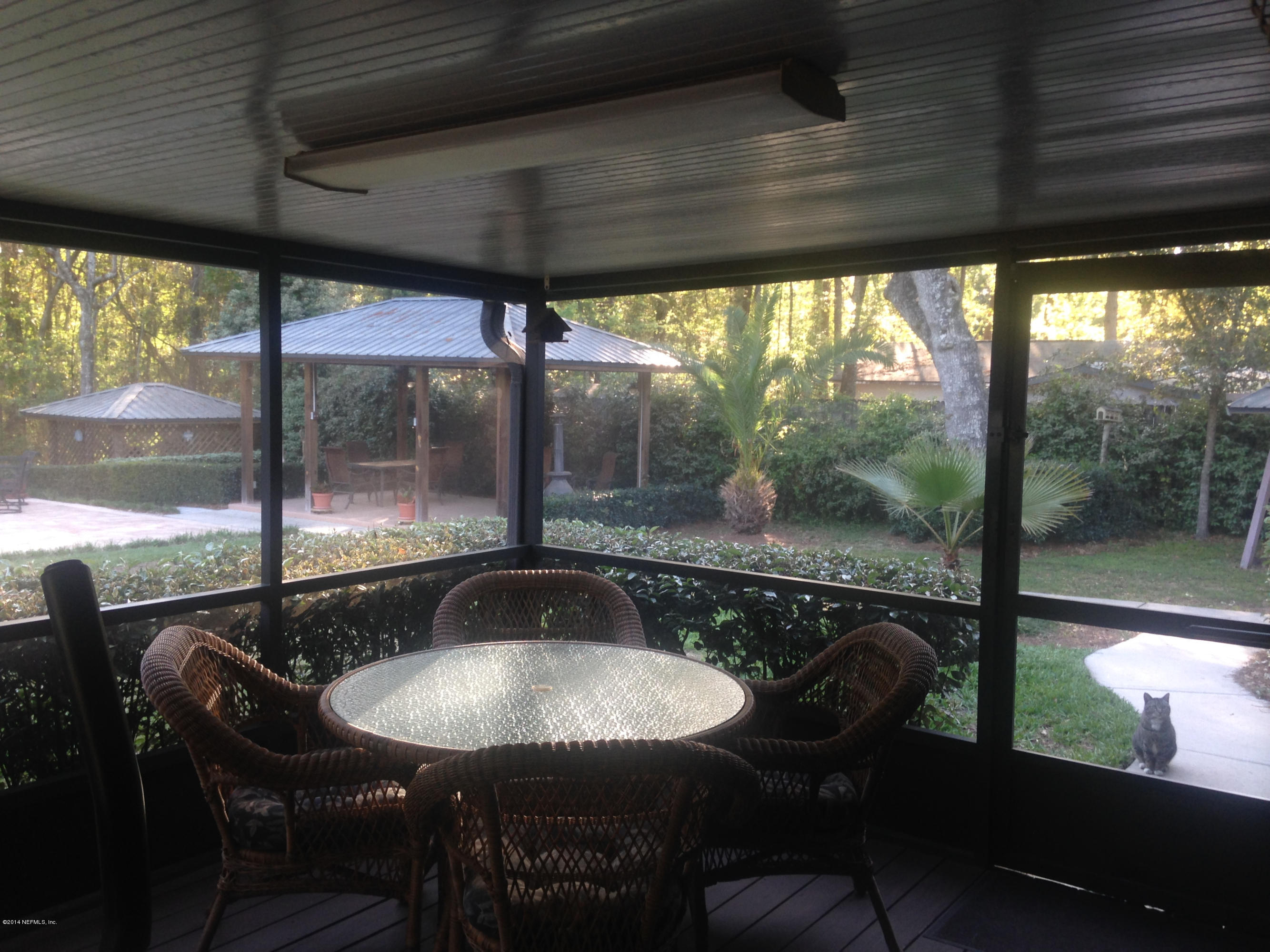 4325 Banks Road Middleburg, FL 32068 - Photo 32 of 61 Screened in Covered Patio