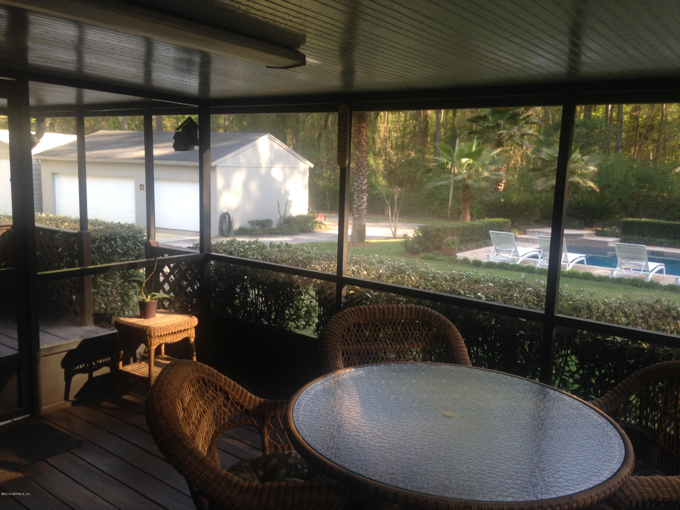 4325 Banks Road Middleburg, FL 32068 - Photo 33 of 61 Screened in Covered Patio