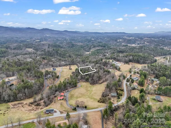 a view of a golf course with a lake