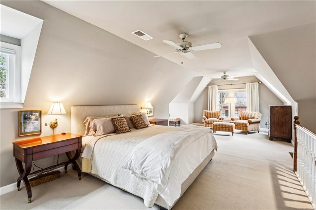 1686 Johnson Road Northeast Atlanta, GA 30306 - Photo 32 of 57 a bedroom with a bed and furniture