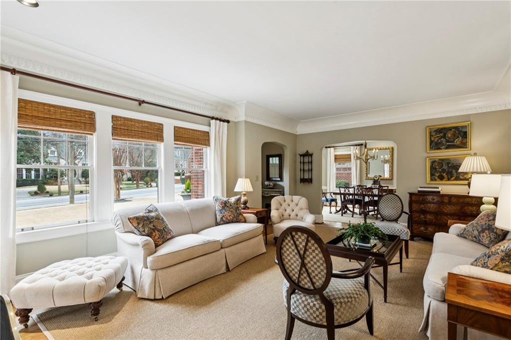 1686 Johnson Road Northeast Atlanta, GA 30306 - Photo 9 of 57 a living room with furniture and a large window