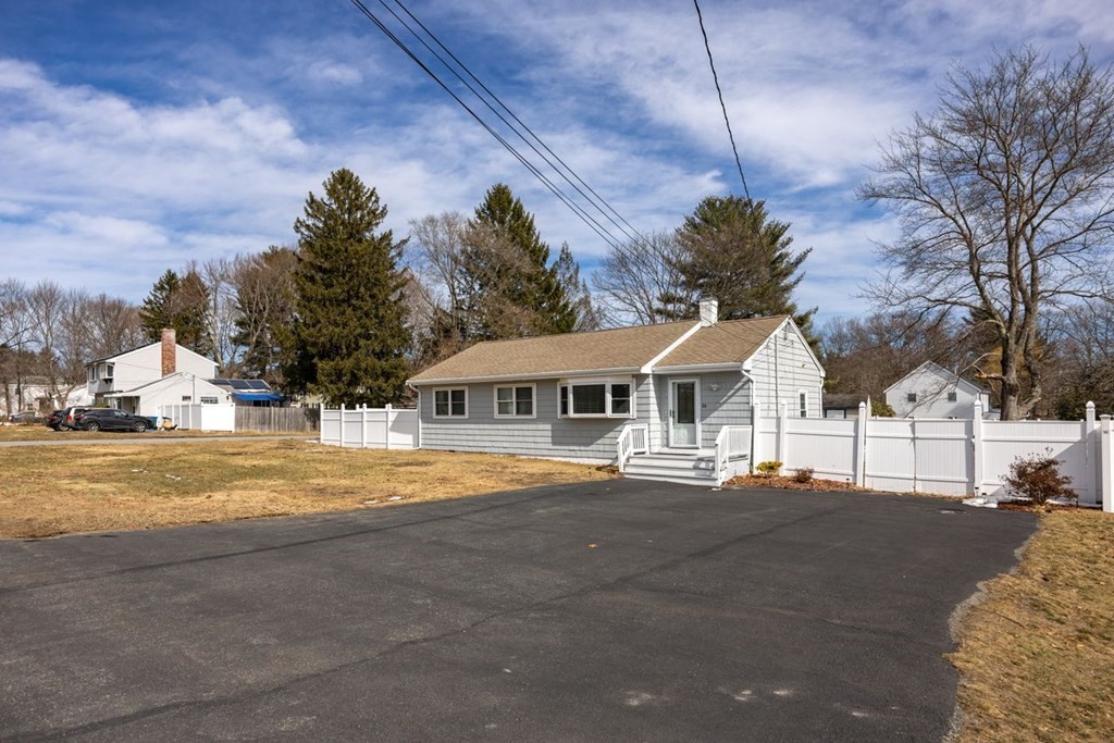 114 Lexington Road Billerica, MA 01821 - Photo 4 of 36 a view of a house with a big yard