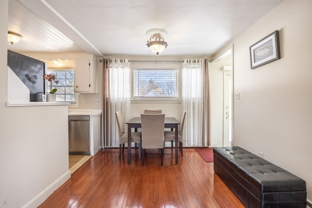 114 Lexington Road Billerica, MA 01821 - Photo 8 of 36 a dining room with furniture and wooden floor
