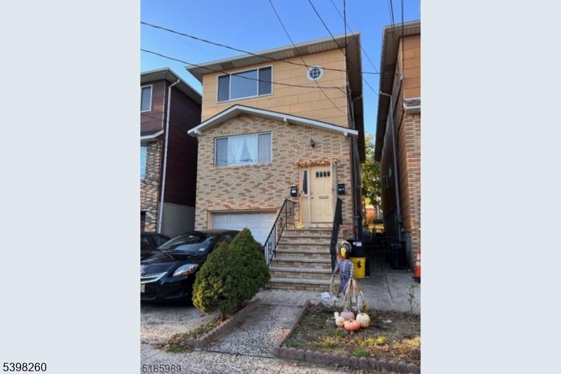 736 William Street Harrison, NJ 07029 - Photo 1 of 10 a view of entryway with workspace