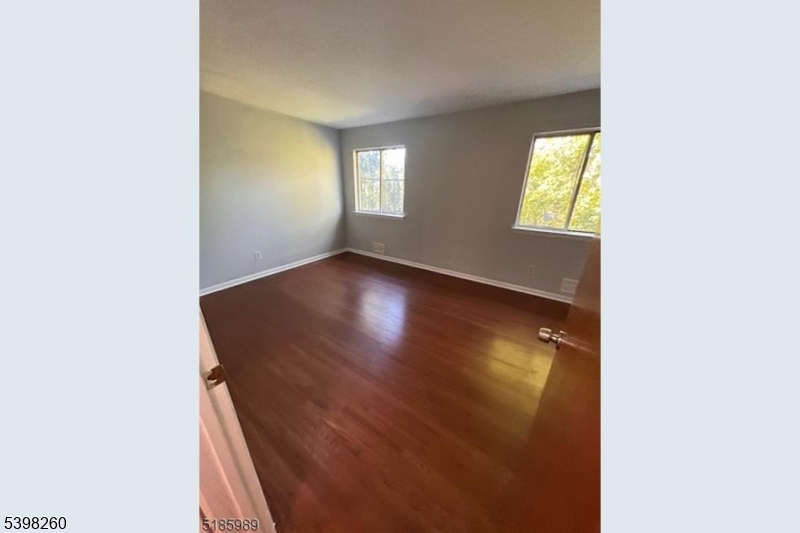 736 William Street Harrison, NJ 07029 - Photo 6 of 10 a view of an empty room and window