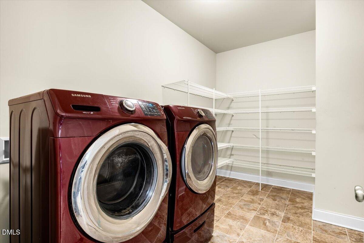 704 Haw River Hopedale Road Burlington, NC 27217 - Photo 20 of 49 a utility room with dryer and washer