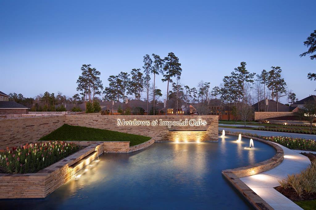 32110 Pond Pine Spring, TX 77386 - Photo 8 of 14 a view of swimming pool with outdoor seating and plants