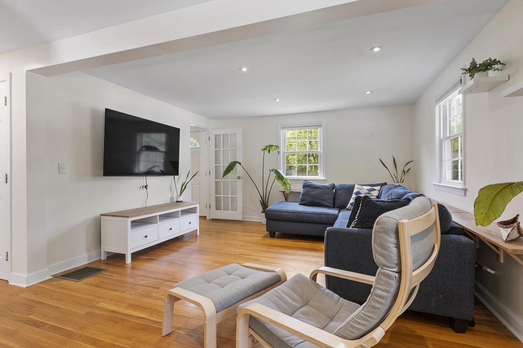6 Edith Road Hudson, MA 01749 - Photo 11 of 30 a living room with furniture and a flat screen tv