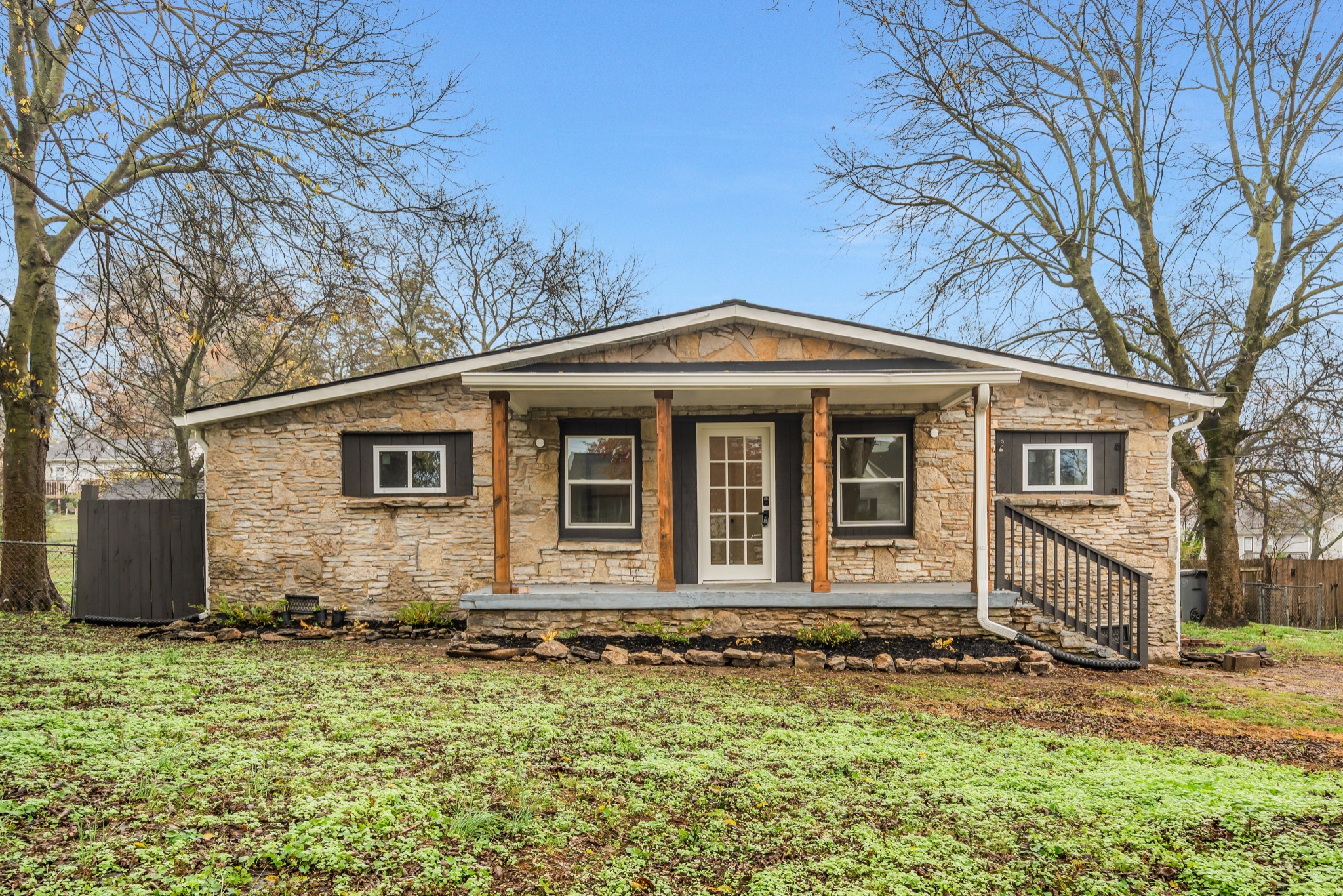 a front view of a house with garden
