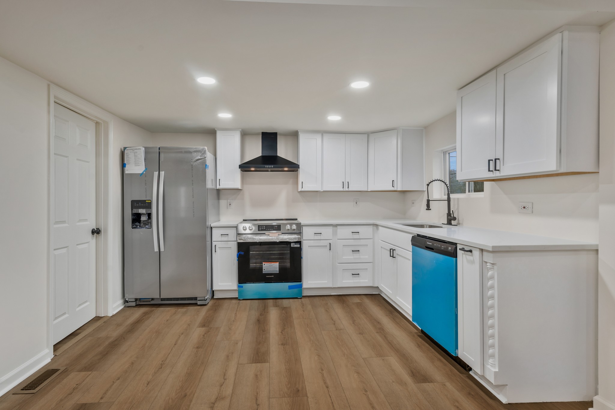 1421 Mohawk Trail Madison, TN 37115 - Photo 11 of 28 a kitchen with stainless steel appliances granite countertop a refrigerator sink and stove