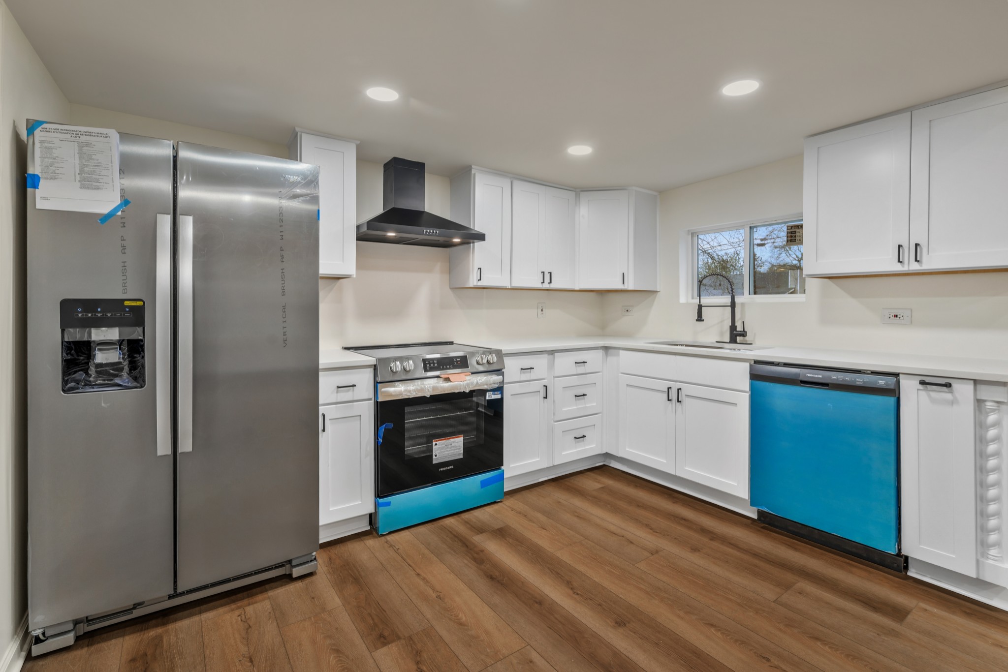 1421 Mohawk Trail Madison, TN 37115 - Photo 12 of 28 a kitchen with stainless steel appliances granite countertop a refrigerator stove and sink