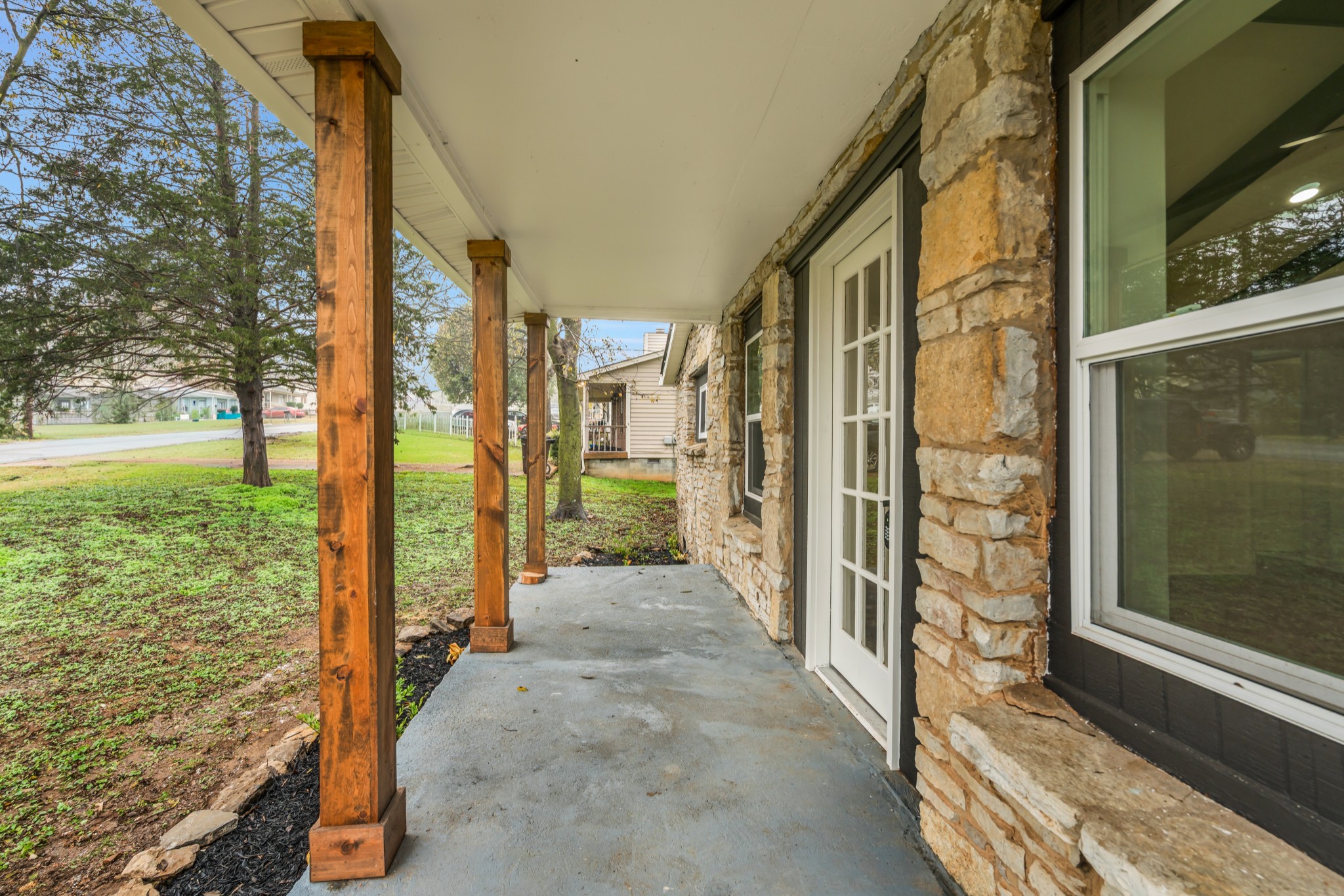 1421 Mohawk Trail Madison, TN 37115 - Photo 5 of 28 a view of a porch with wooden floor and outdoor space