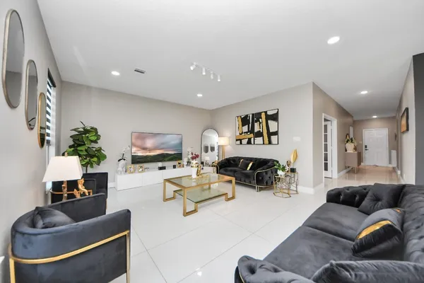 a living room with furniture and a couch