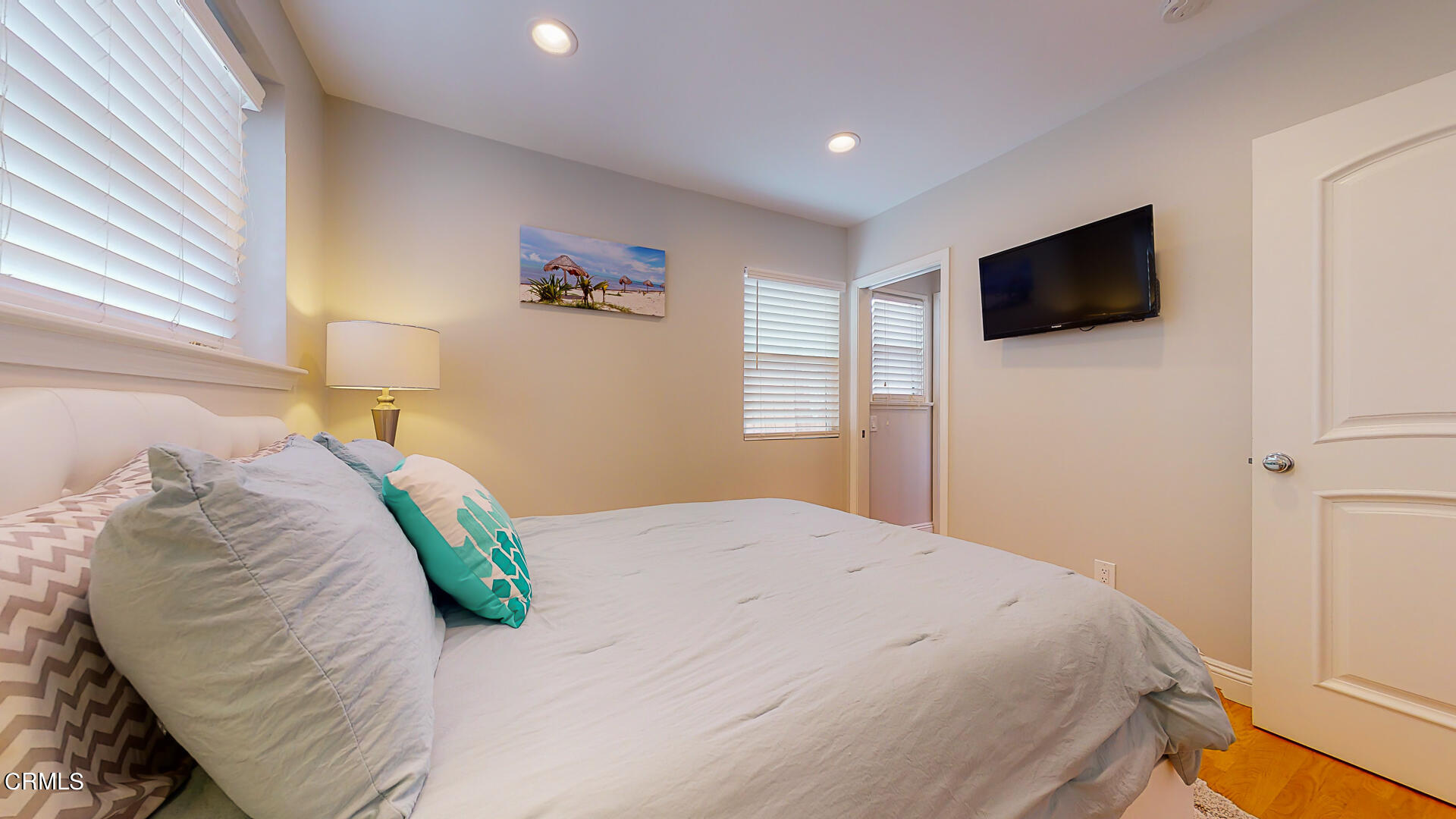 11052 Corley Drive Whittier, CA 90604 - Photo 15 of 39 a bedroom with a bed and a television