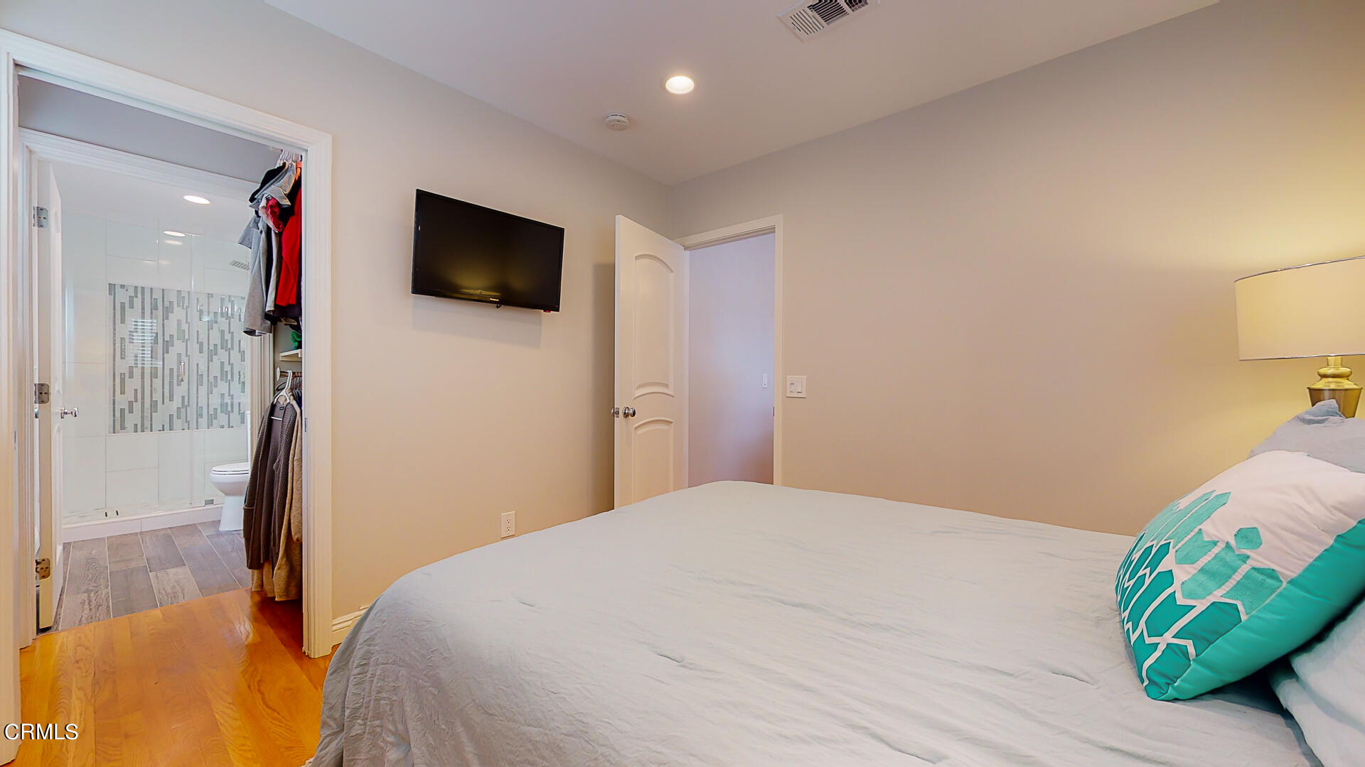 11052 Corley Drive Whittier, CA 90604 - Photo 16 of 39 a bedroom with a bed and a television