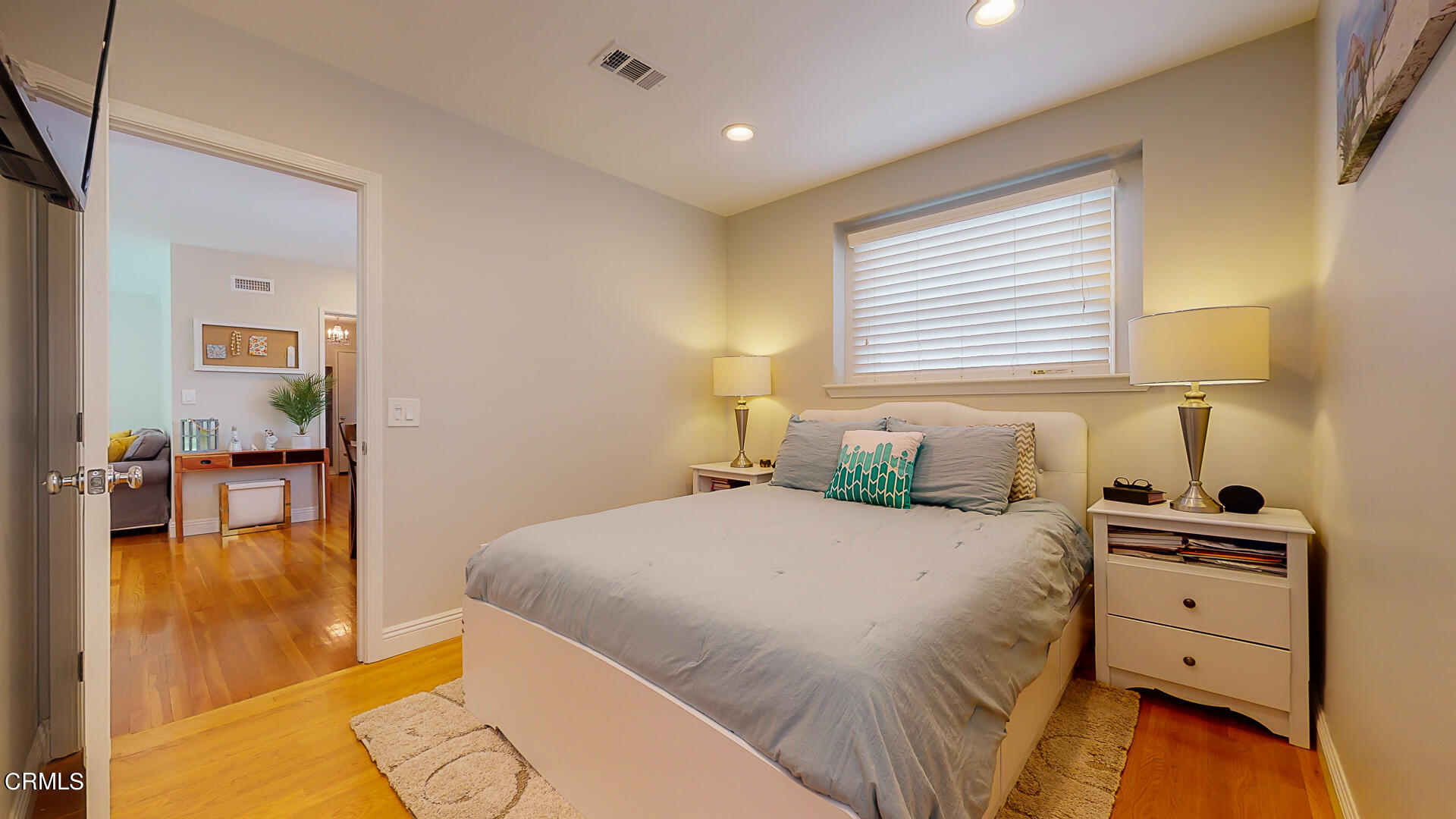 11052 Corley Drive Whittier, CA 90604 - Photo 17 of 39 a bedroom with a bed and a view of kitchen