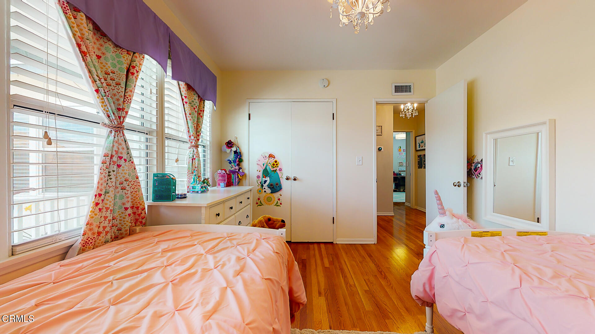 11052 Corley Drive Whittier, CA 90604 - Photo 22 of 39 a bed sitting in a bedroom next to a window