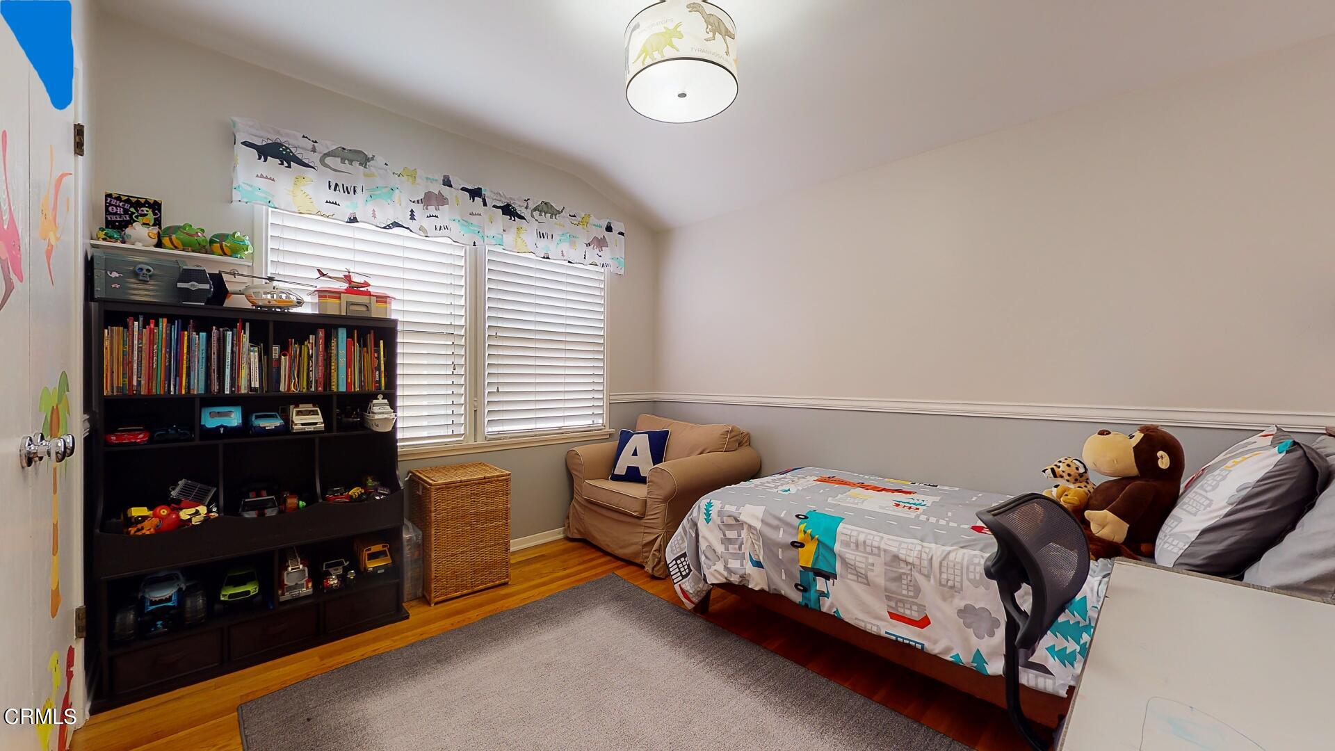 11052 Corley Drive Whittier, CA 90604 - Photo 23 of 39 a bedroom with bed and a window