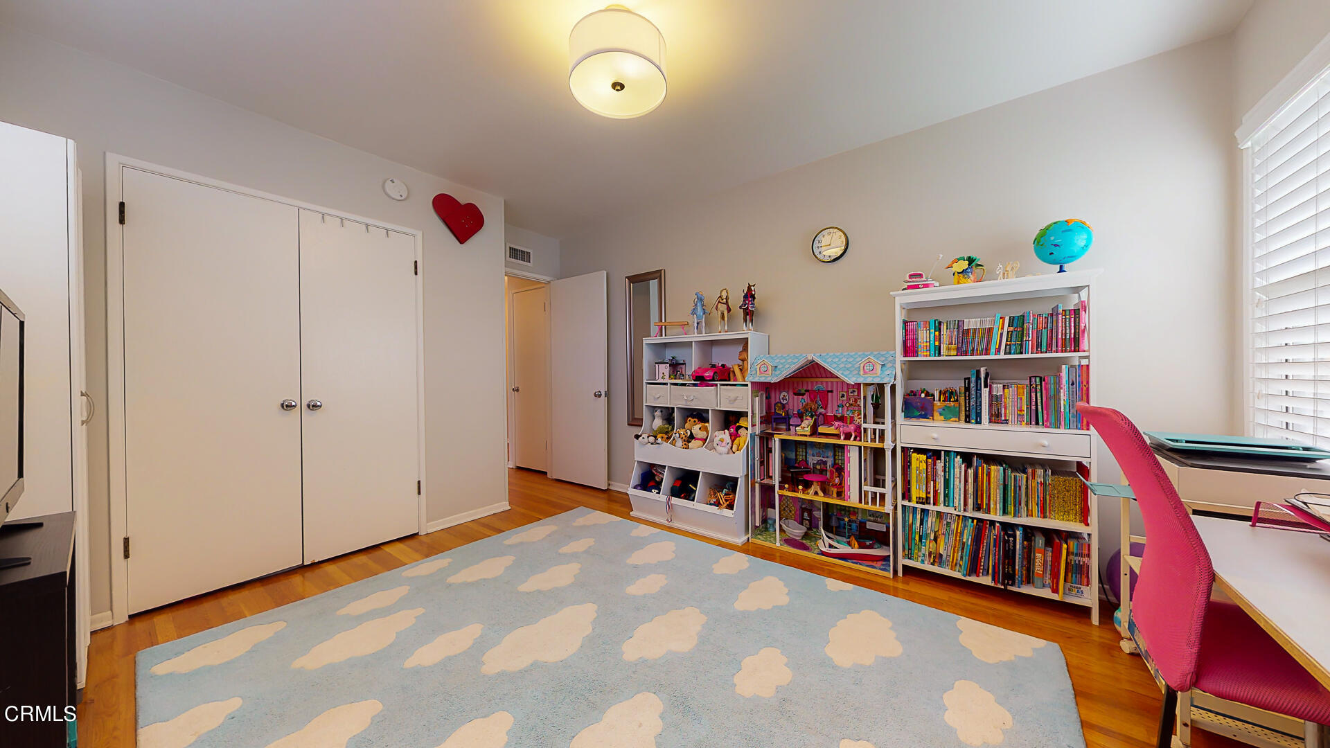 11052 Corley Drive Whittier, CA 90604 - Photo 26 of 39 a room with furniture and a book shelf