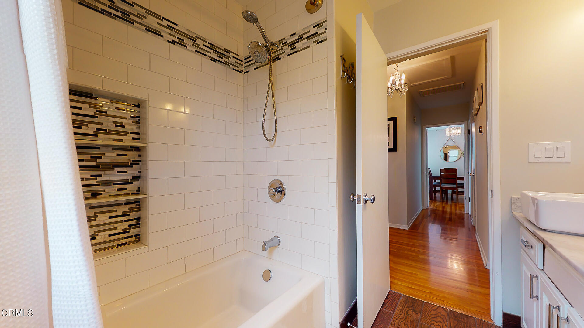 11052 Corley Drive Whittier, CA 90604 - Photo 29 of 39 a bathroom with a bathtub and a shower