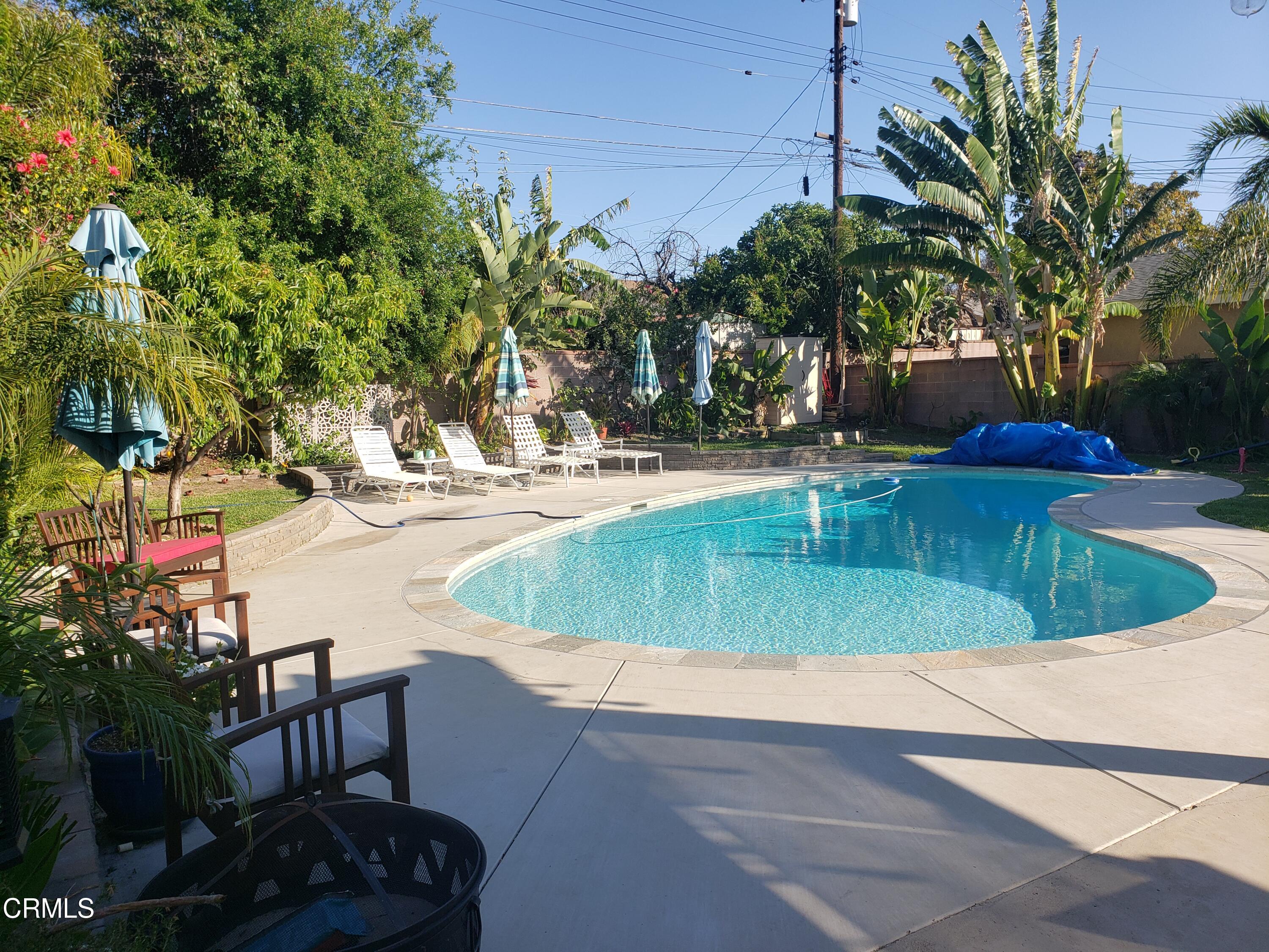 11052 Corley Drive Whittier, CA 90604 - Photo 33 of 39 a view of a swimming pool with a patio