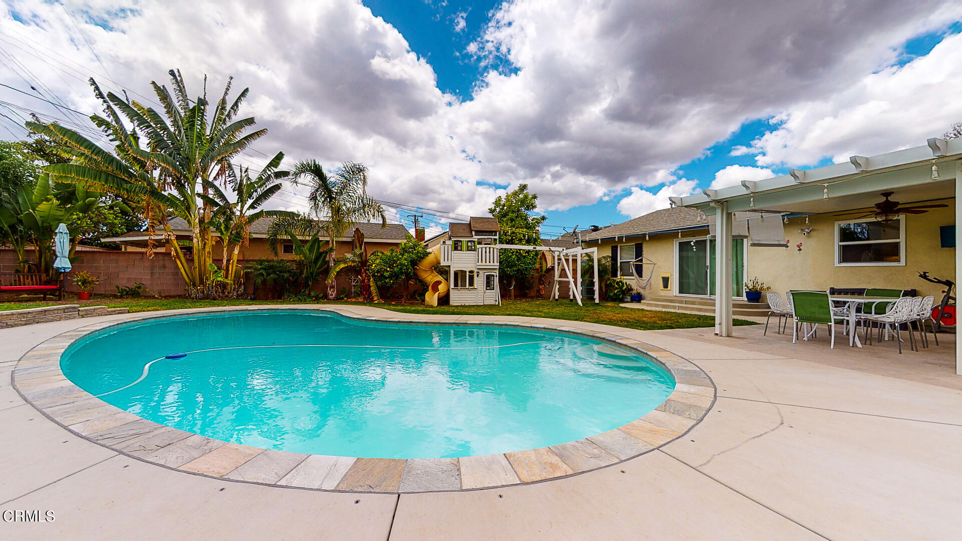 11052 Corley Drive Whittier, CA 90604 - Photo 35 of 39 a view of a swimming pool with a patio