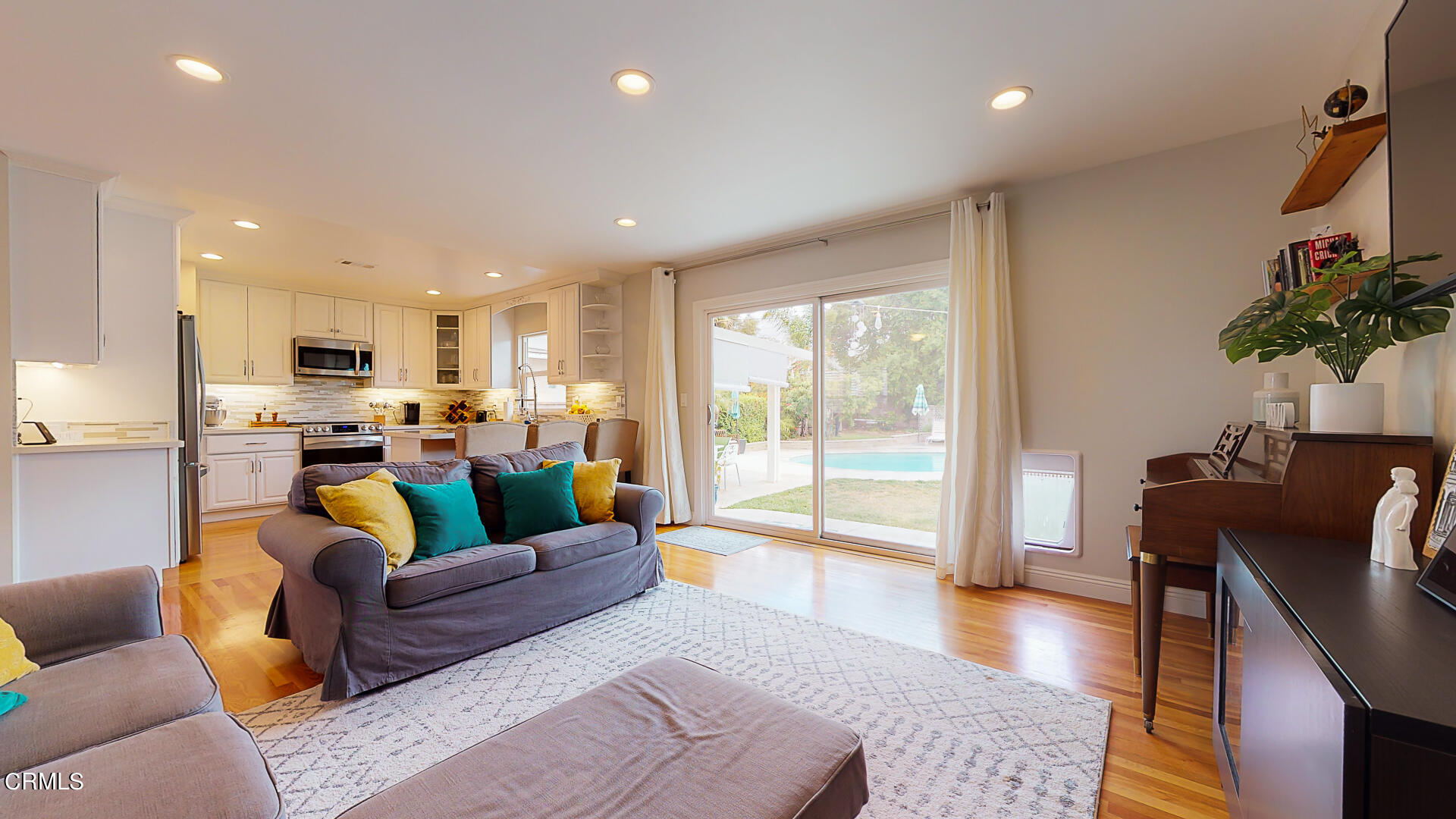 11052 Corley Drive Whittier, CA 90604 - Photo 4 of 39 a living room with furniture and a large window