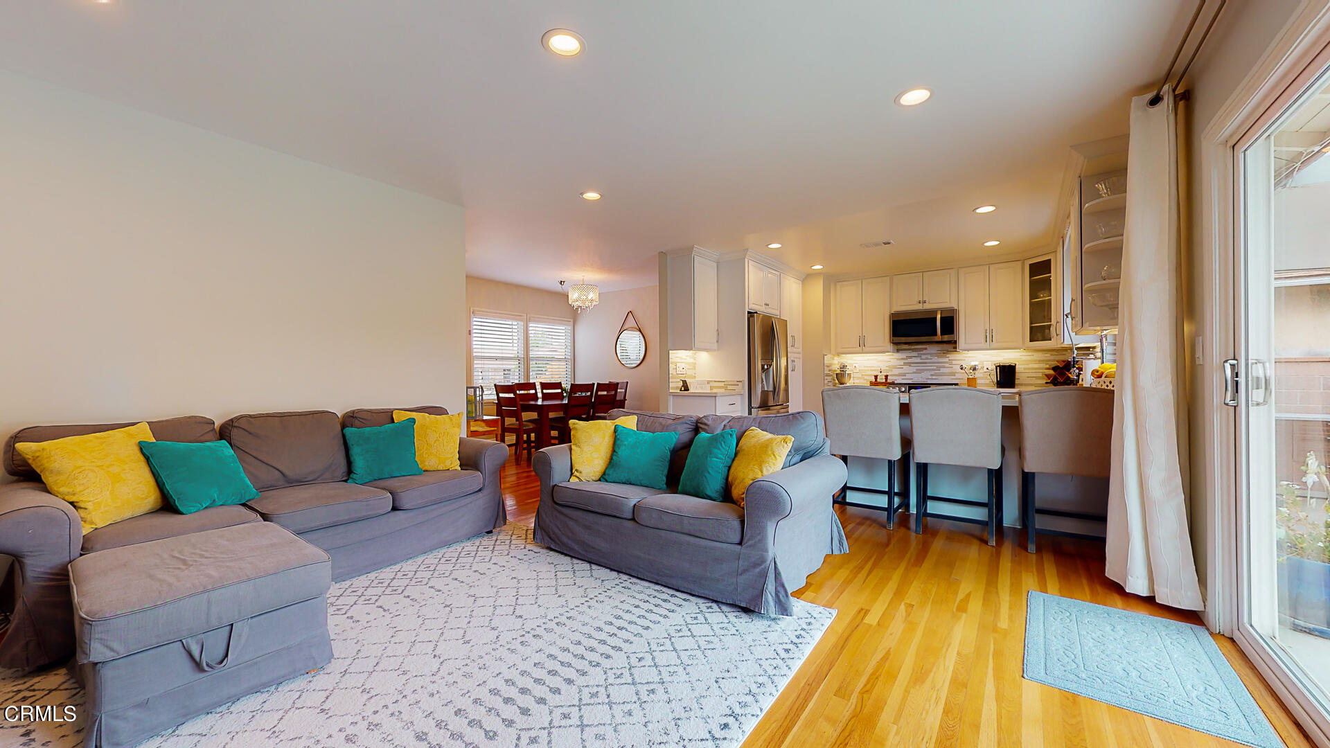 11052 Corley Drive Whittier, CA 90604 - Photo 5 of 39 a living room with furniture and kitchen view
