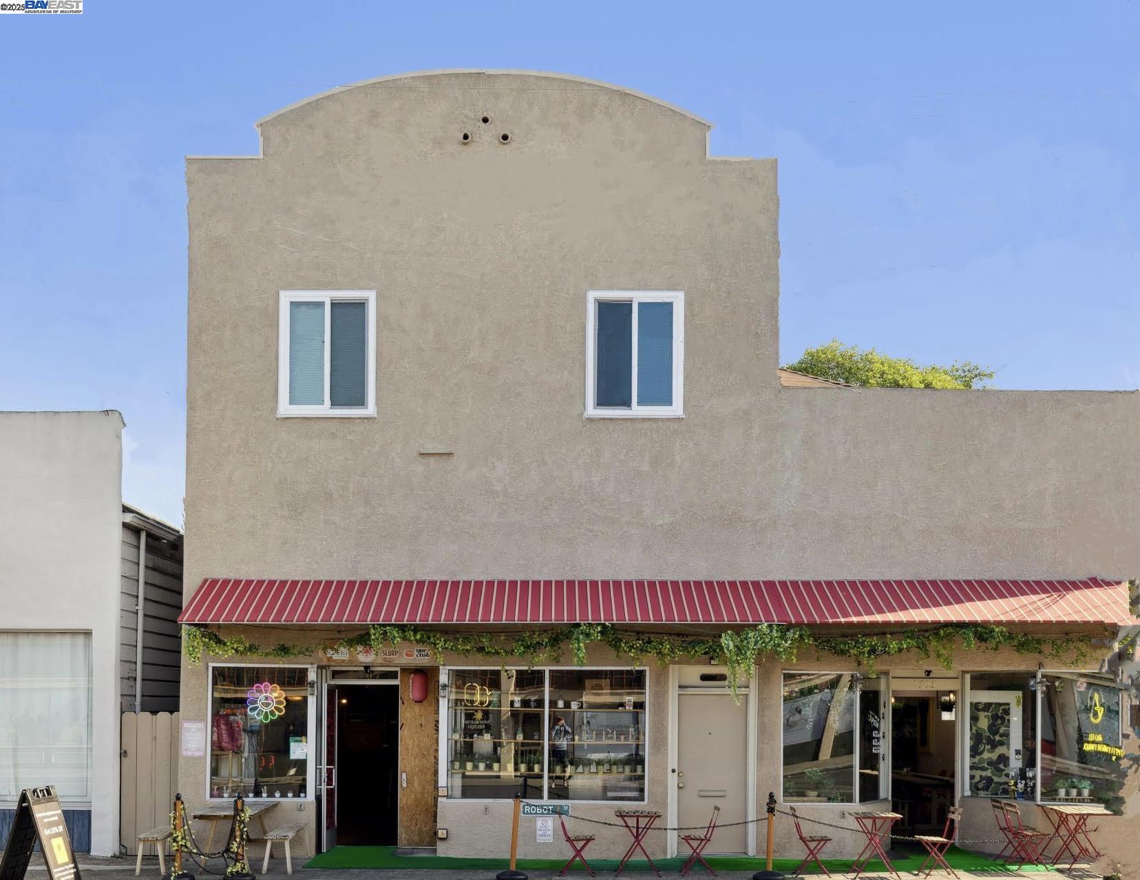 a man standing on a door of a building
