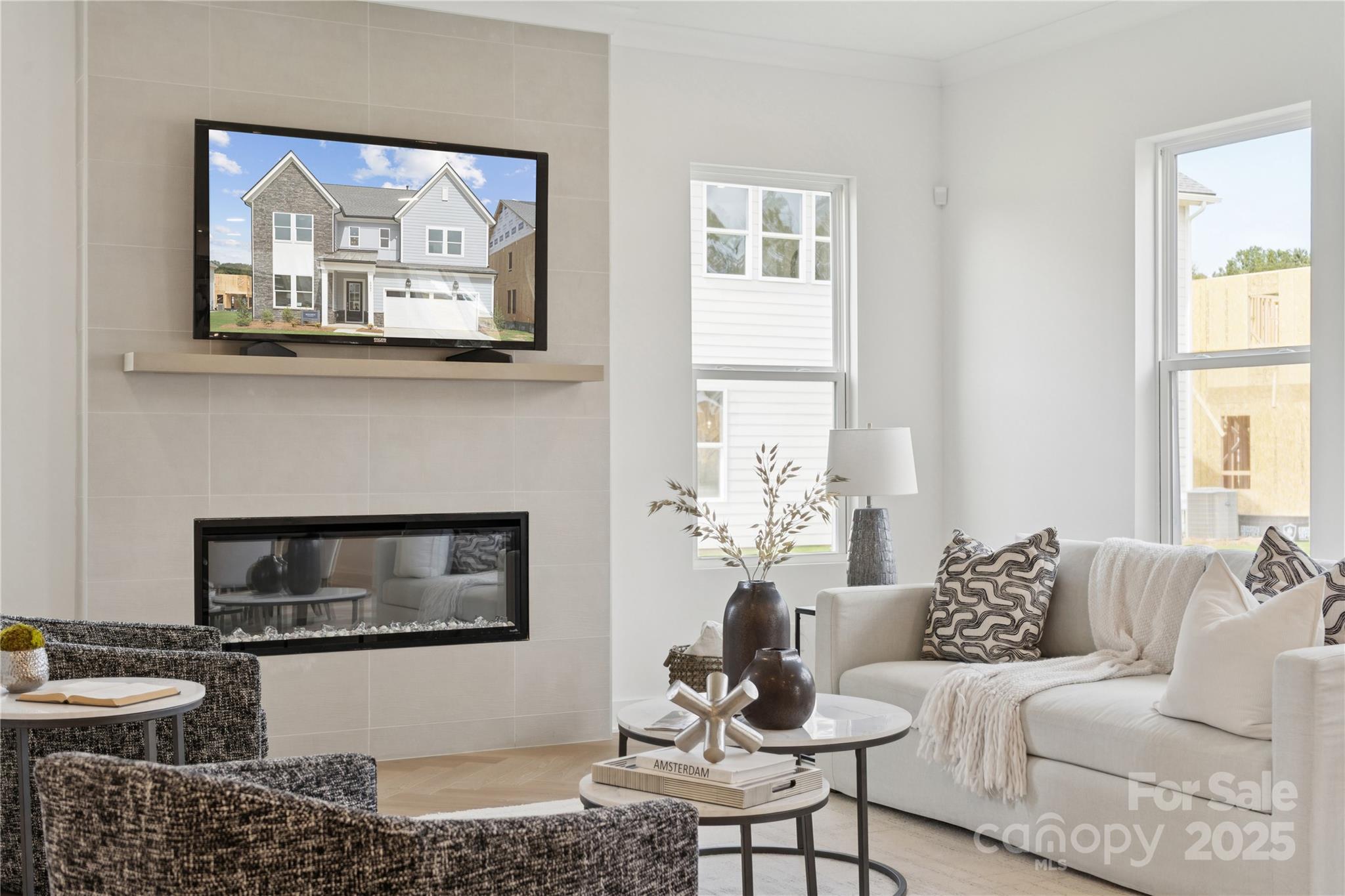5305 Vernon Rdg Road, Unit 117 Huntersville, NC 28078 - Photo 7 of 11 a living room with furniture and a fireplace