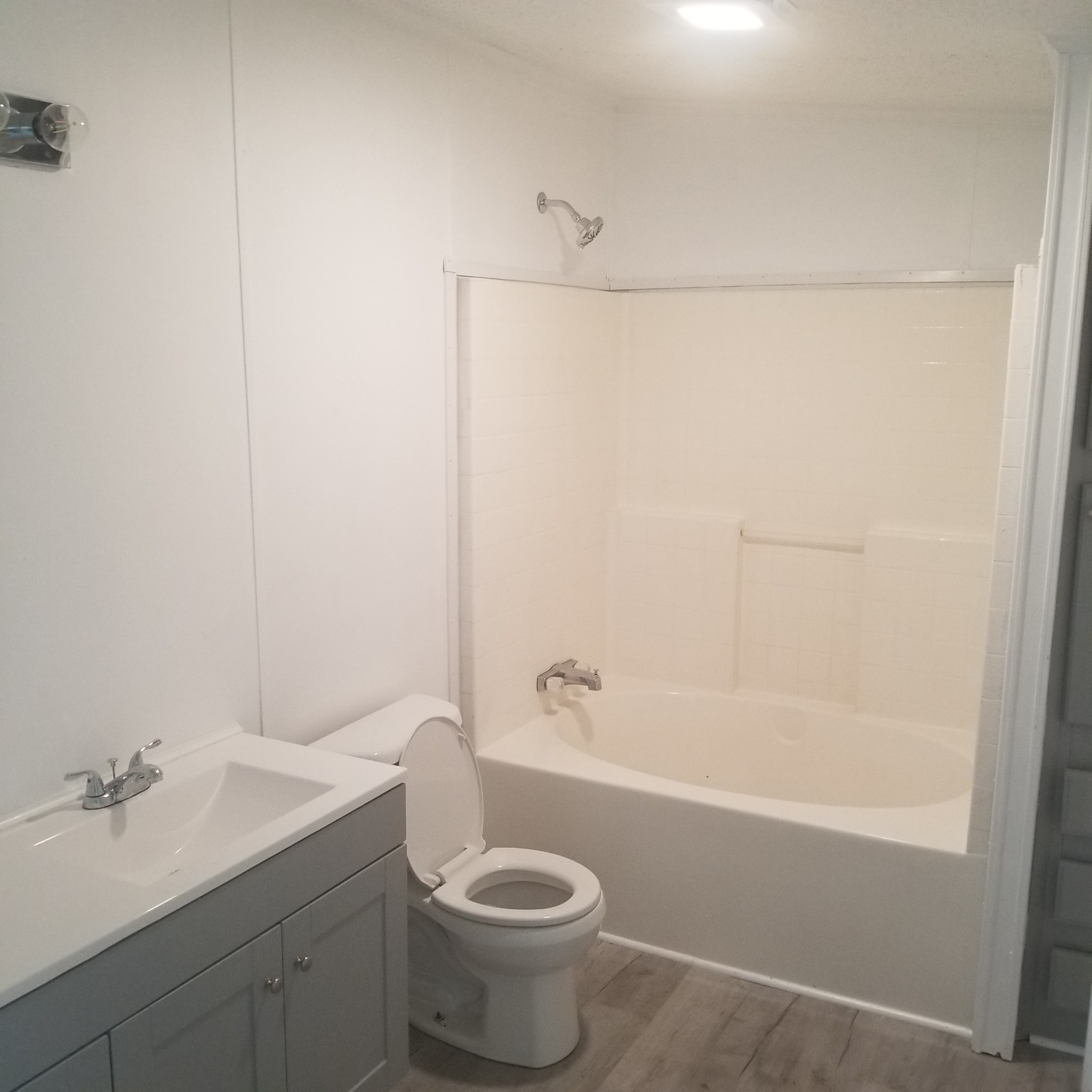 5118 New Harmony Road Hartsville, TN 37074 - Photo 13 of 13 a bathroom with a sink a toilet and shower