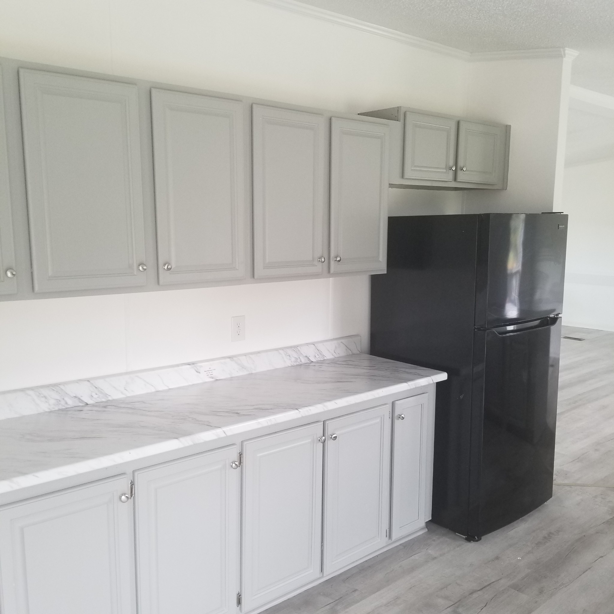 5118 New Harmony Road Hartsville, TN 37074 - Photo 4 of 13 a kitchen with a sink and cabinets