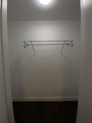 a view of small space with racks on the wall