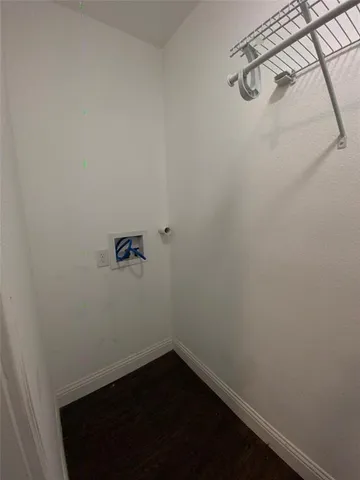 a view of small space with racks on the wall